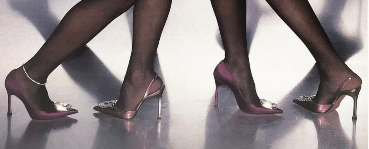 Amina Muaddi luxury footwear defined by sculptural heels, crystal embellishments, and a bold, modern expression of glamour.