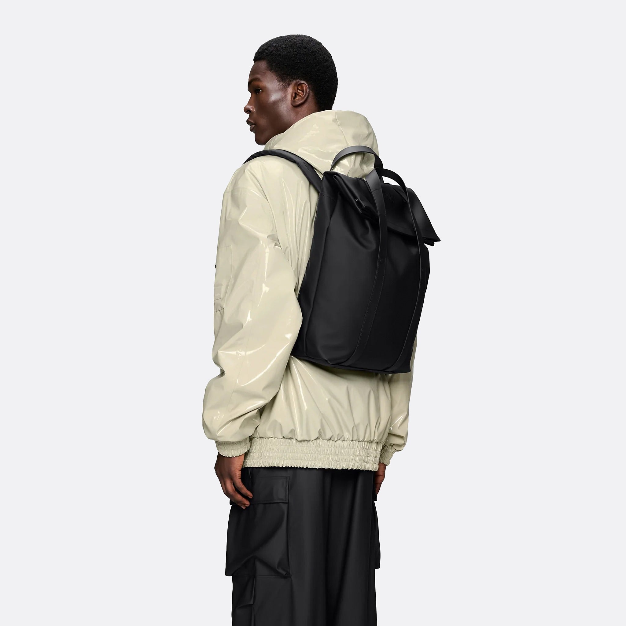 The 2 Way Tote Backpack from Rains in Black