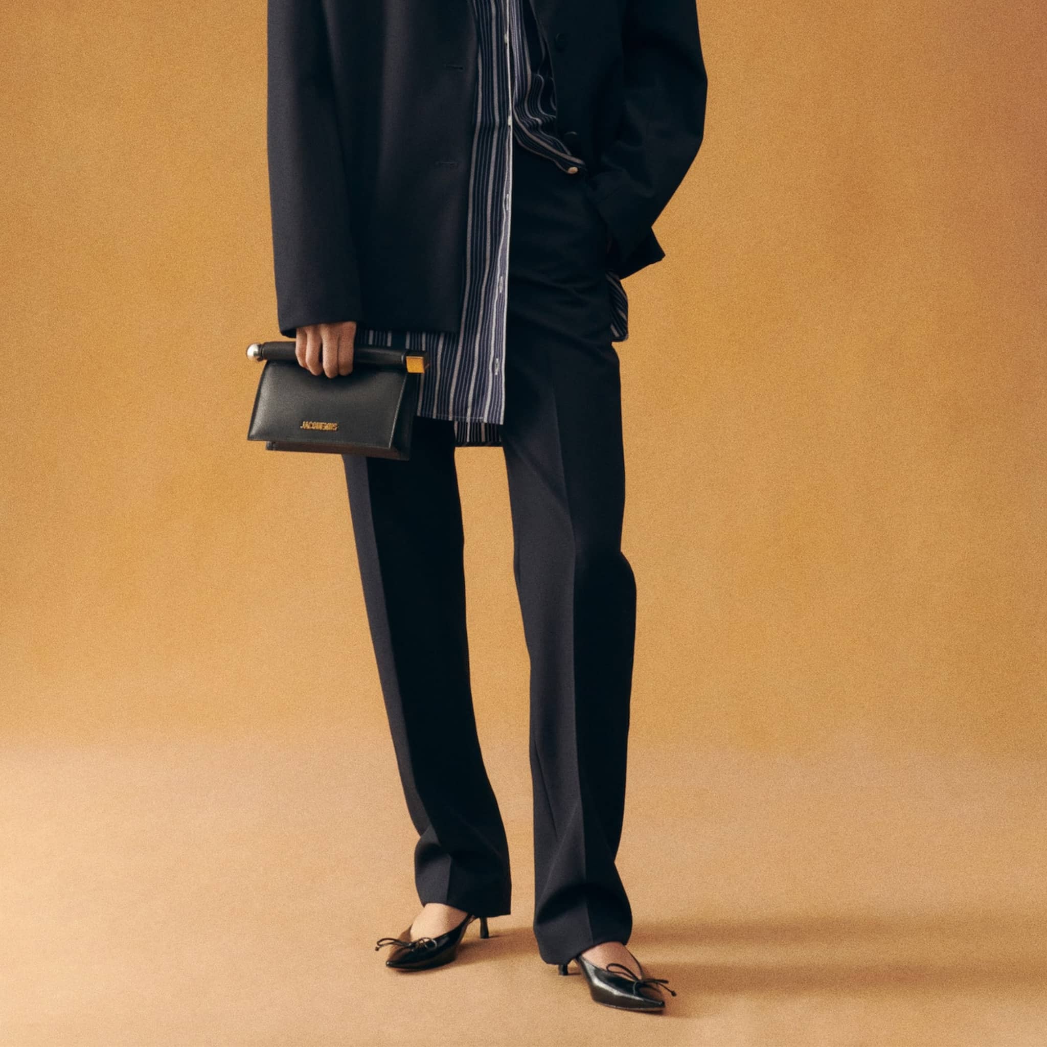 The Le Rond Carré Small Clutch from Jacquemus in Black