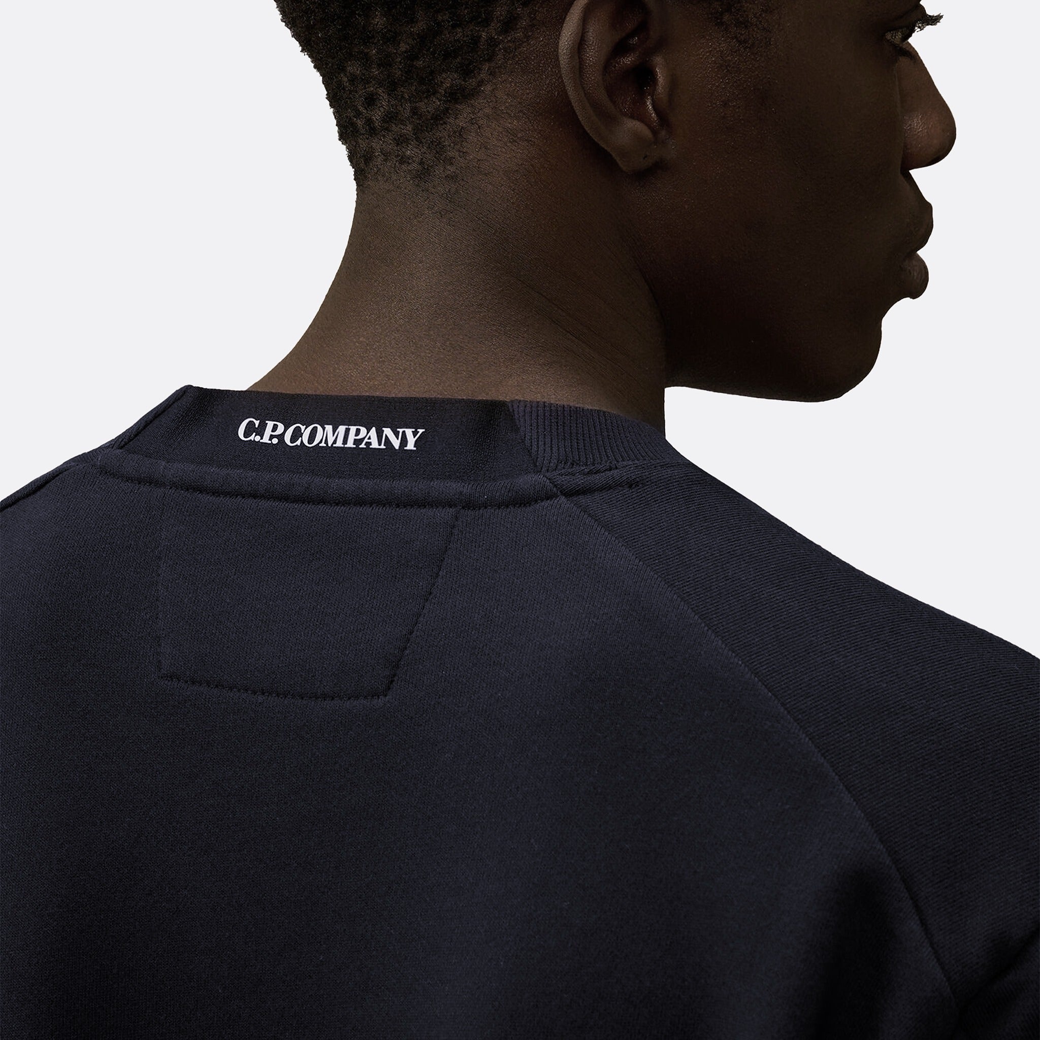 Diagonal Raised Fleece Crewneck Lens Sweatshirt from C.P. Company in Navy