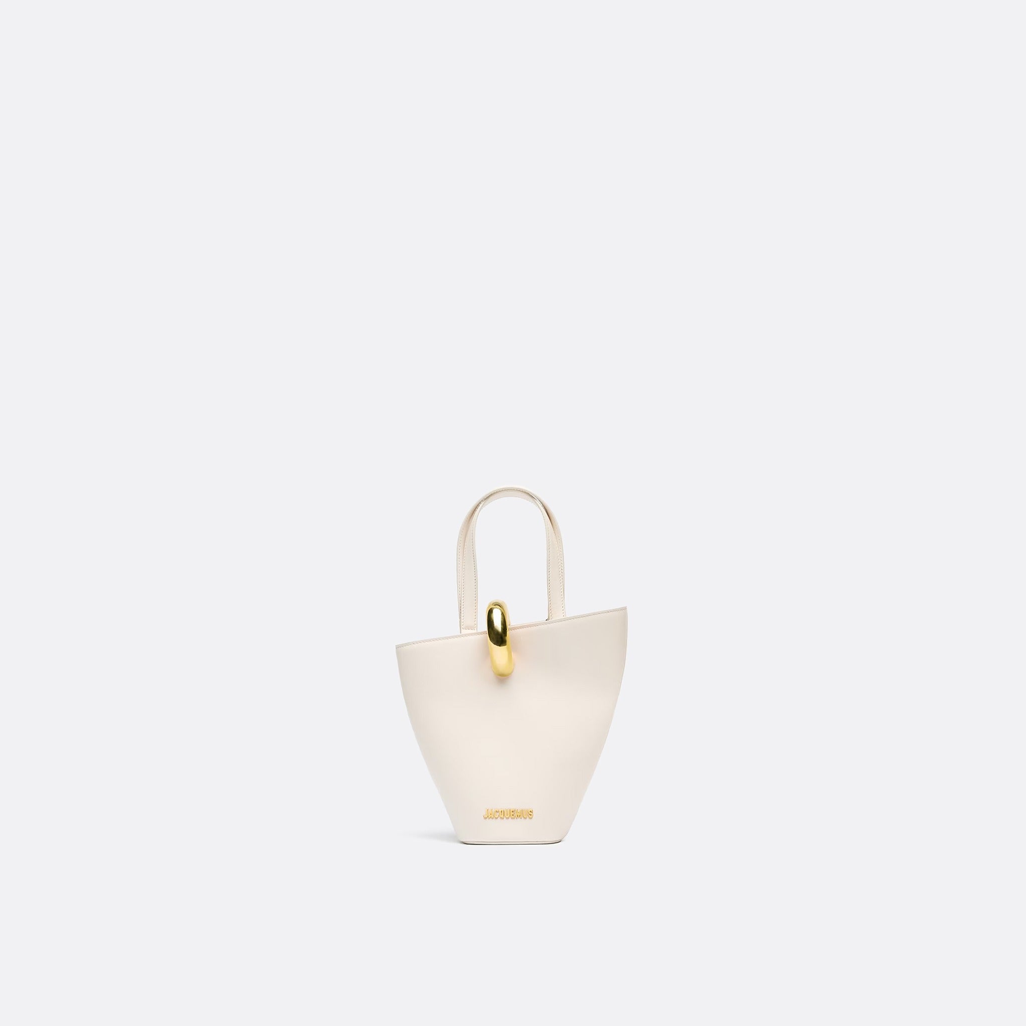 The Small Bambola Asymmetric Mini Bucket Bag from Jacquemus