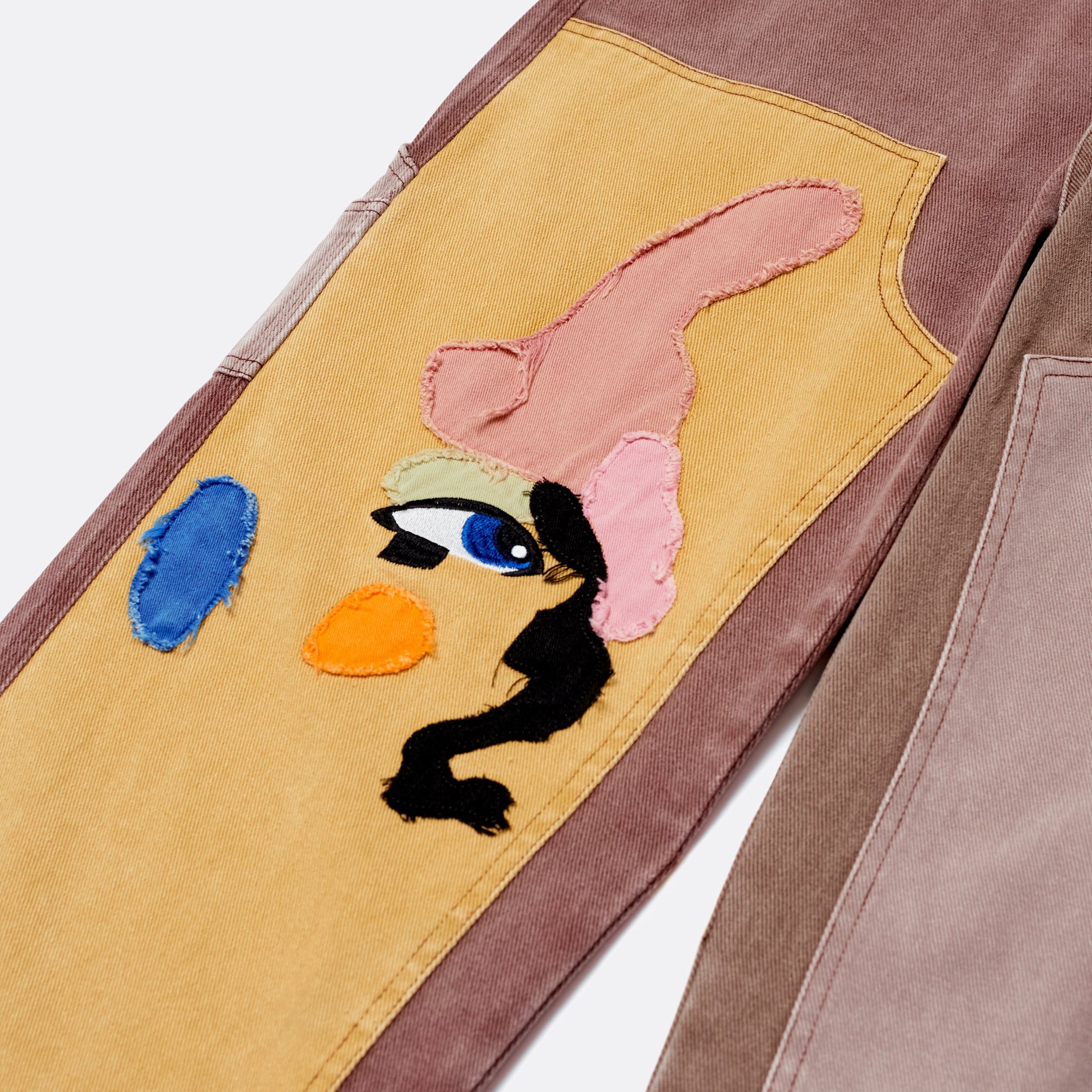 ELLIS ROSCH KidSuper Patchwork Face Double Knee Pants