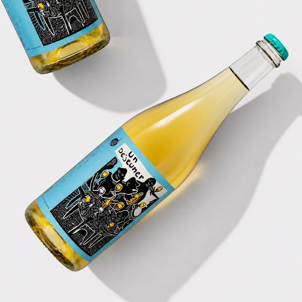 Un Déjeuner natural wine bottle with illustrated label – luxury lifestyle inspiration