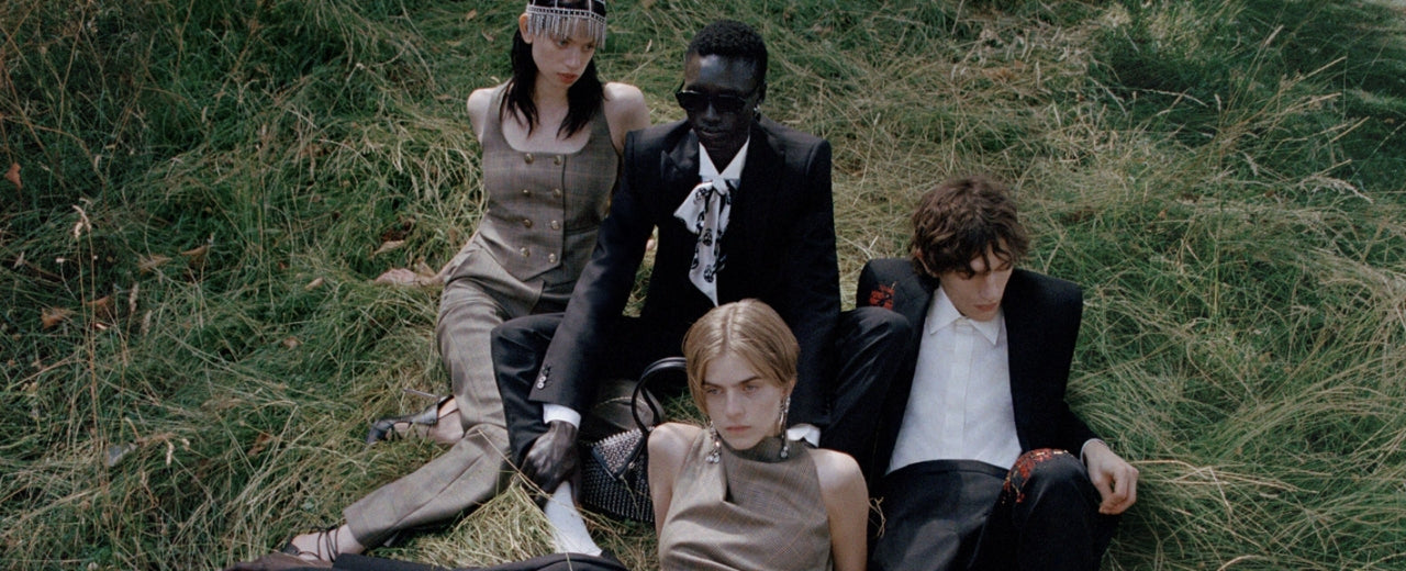 Alexander McQueen luxury fashion defined by dramatic tailoring, romantic tension, and a darkly poetic approach to contemporary design rooted in craftsmanship and emotional expression.