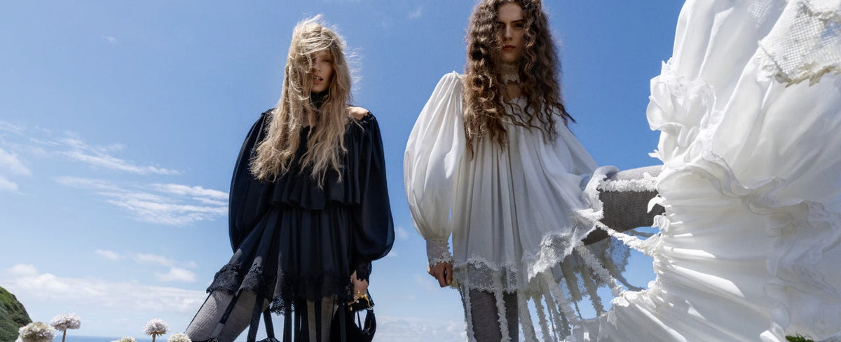 Chloé fashion editorial featuring romantic black and white dresses with flowing silhouettes – shop Chloé at ELLIS ROSCH
