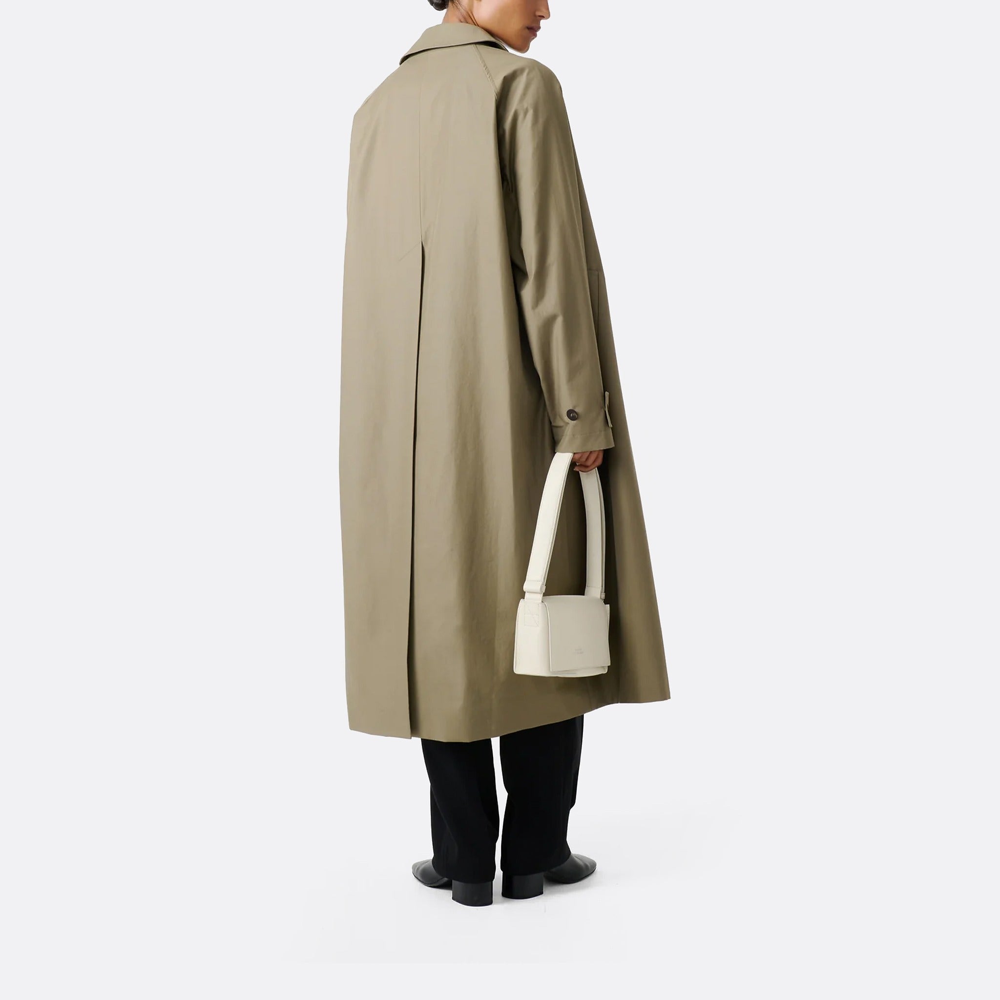 The Holin Coated Cotton Coat from Studio Nicholson