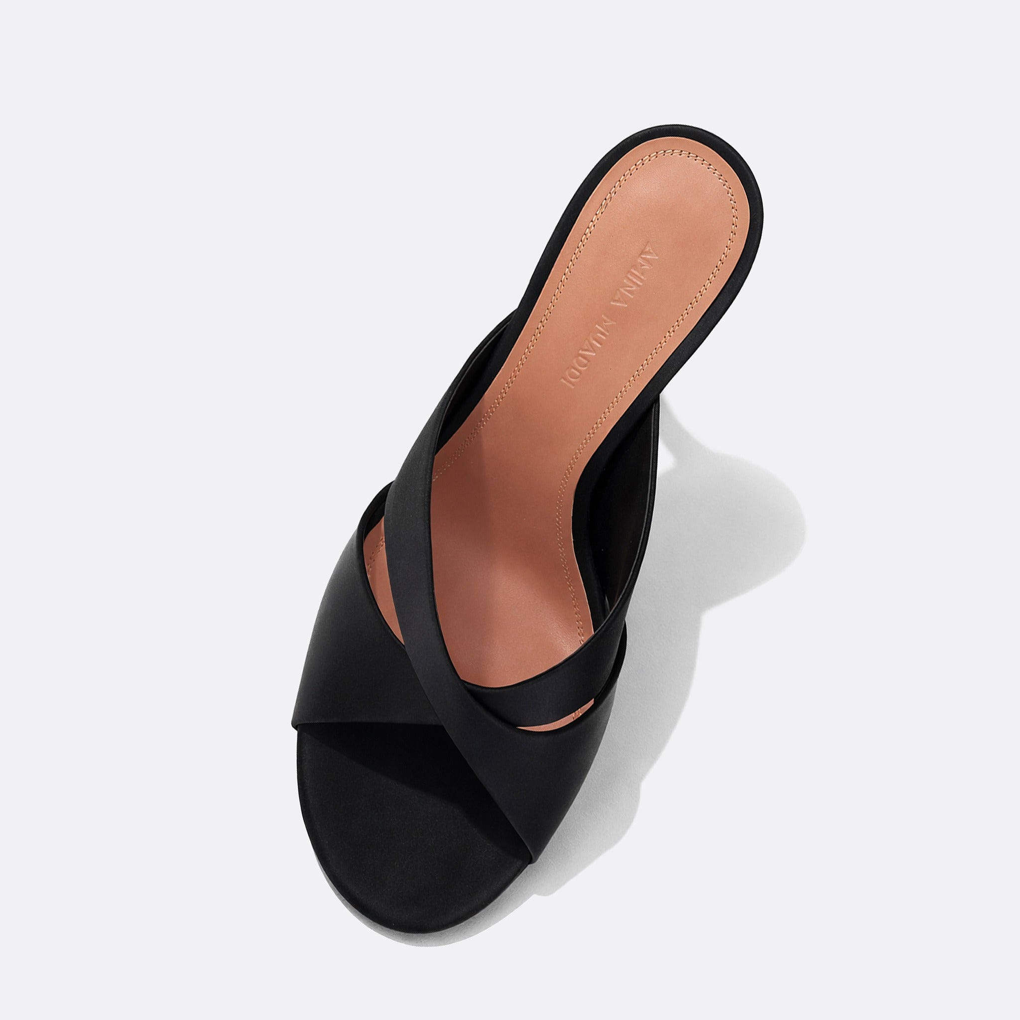 Salma Mules Sandals from Amina Muaddi.