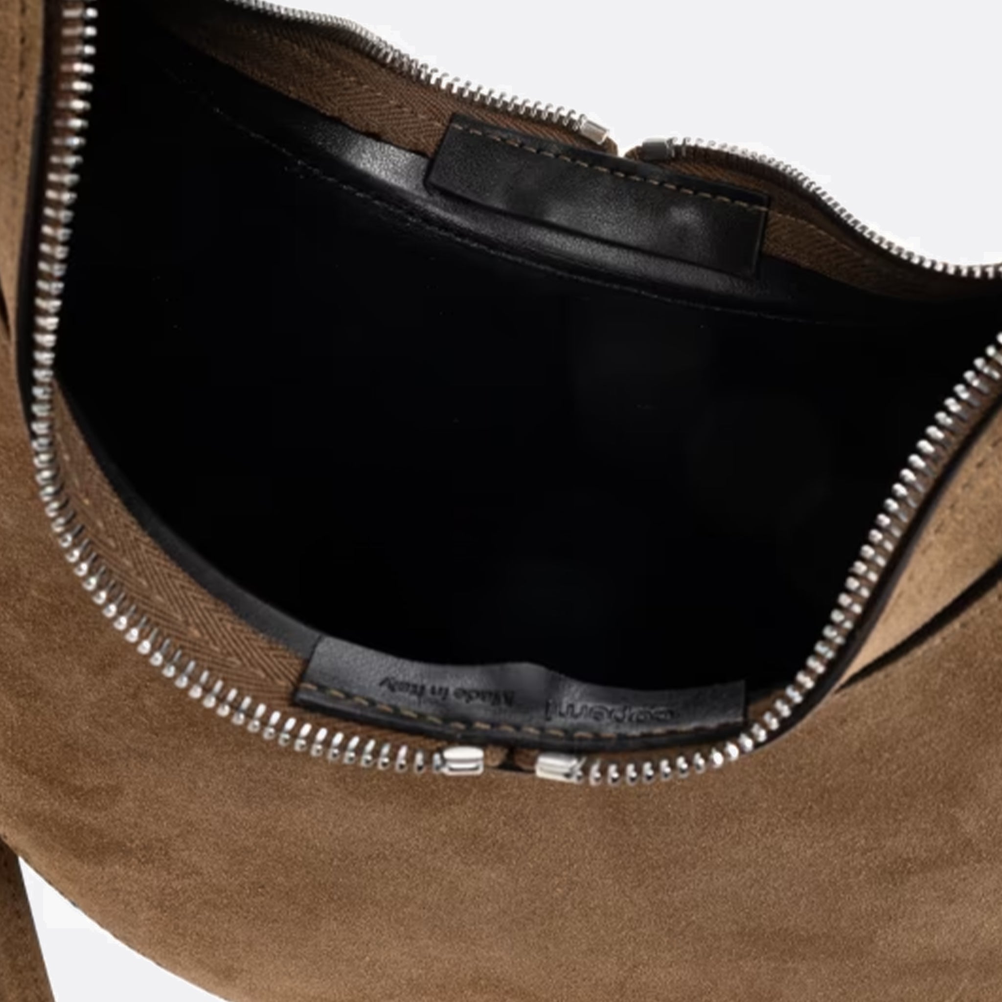 The Suede Swipe Crossbody Bag&nbsp;from Coperni