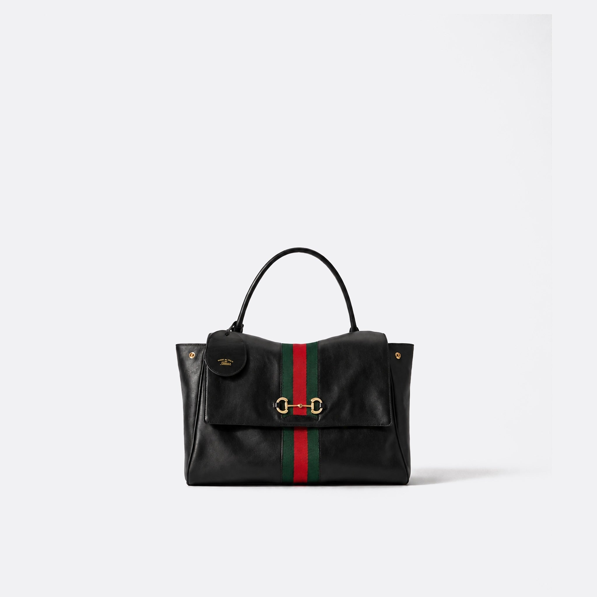 Paparazzo Medium Top Handle Bag from Gucci
