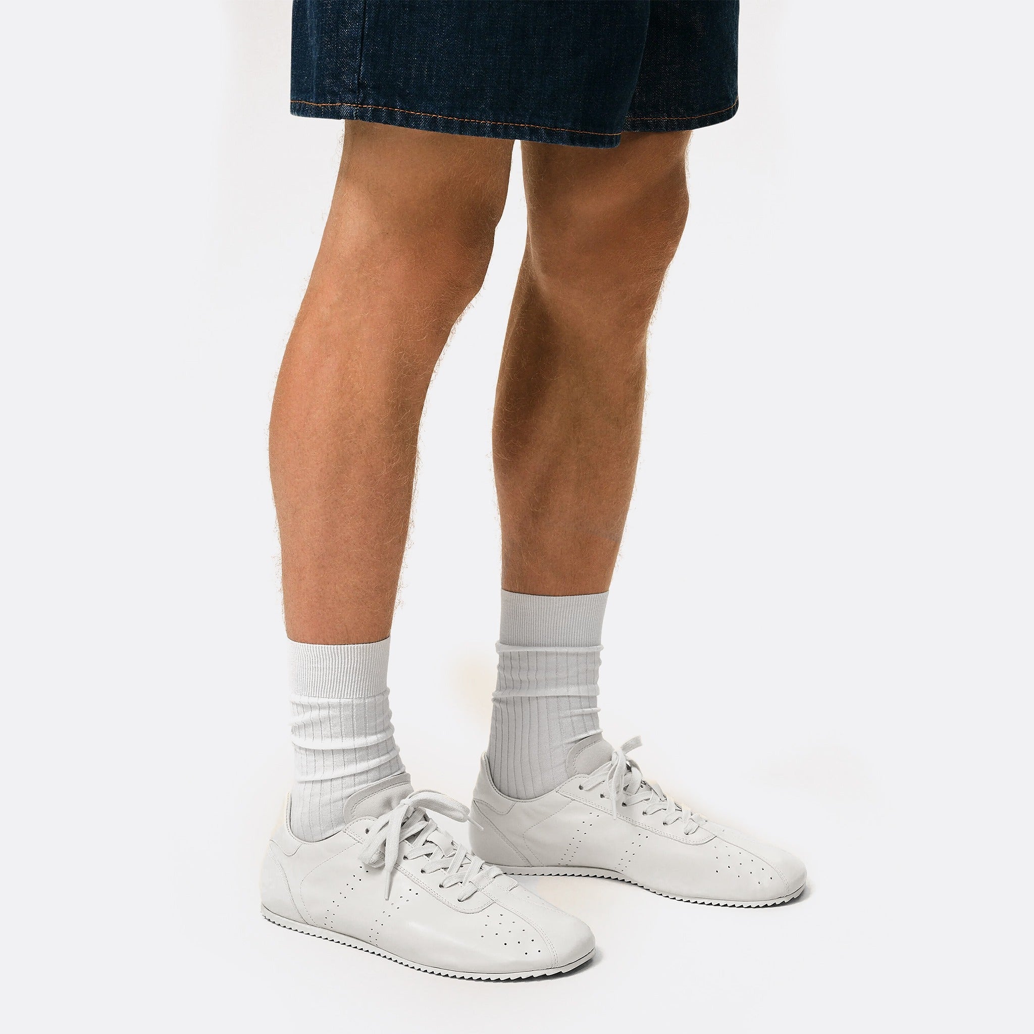 The Low Top Step Sneakers from AMI Paris in White