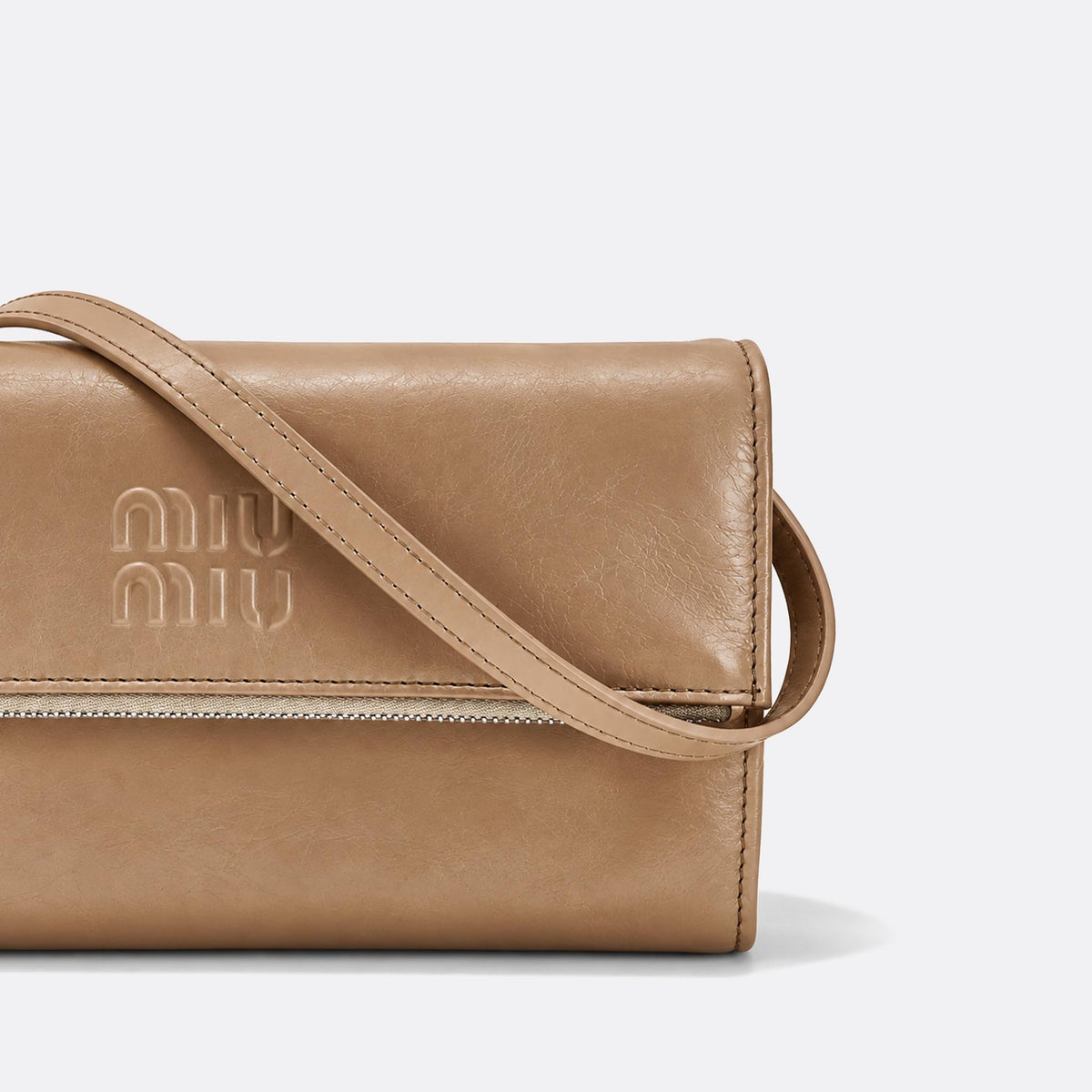 Logo-Embossed Leather Crossbody Bag from Miu Miu