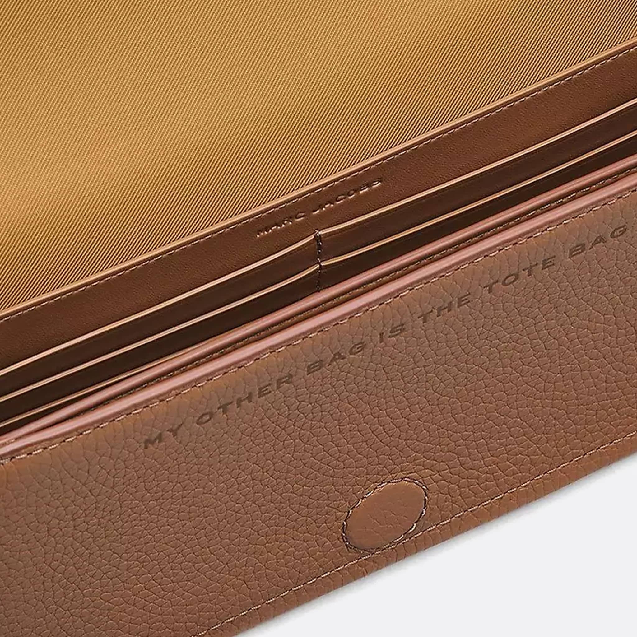 The Leather Mini Crossbody Bag from Marc Jacobs in Argan Oil