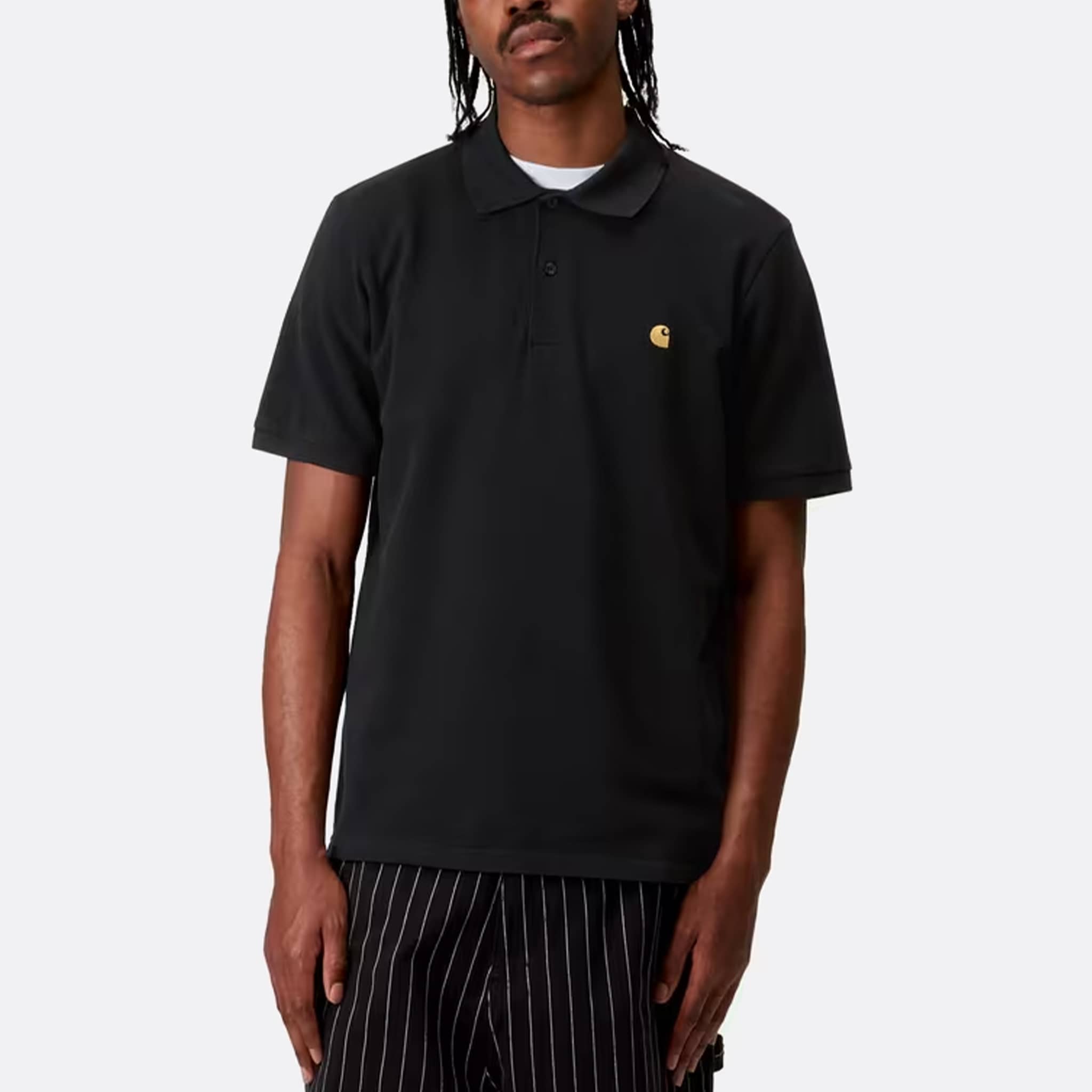 The S/S Chase Pique Polo from Carhartt WIP in Black