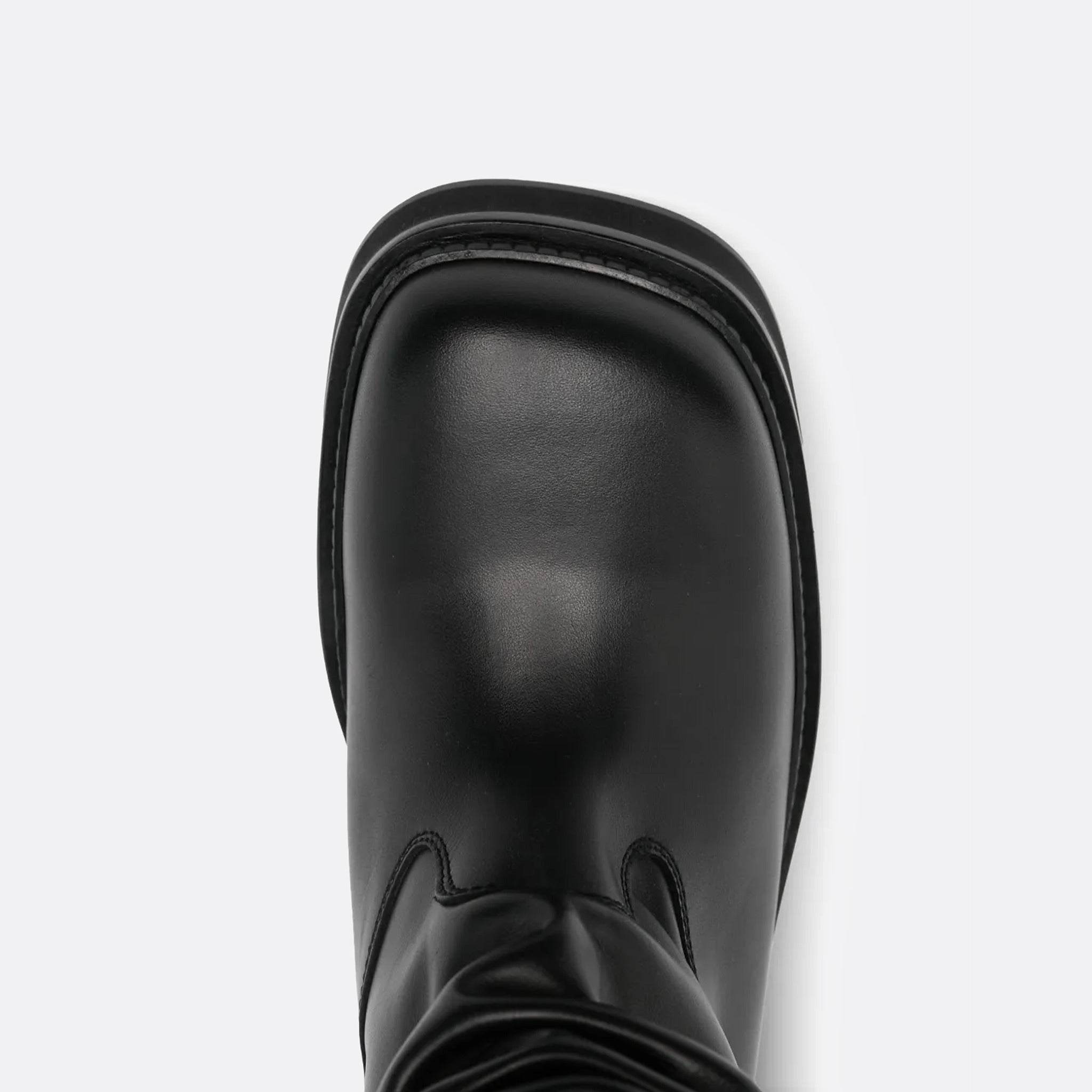 The Robin Passeggiata Leather Boots from The Attico in Black