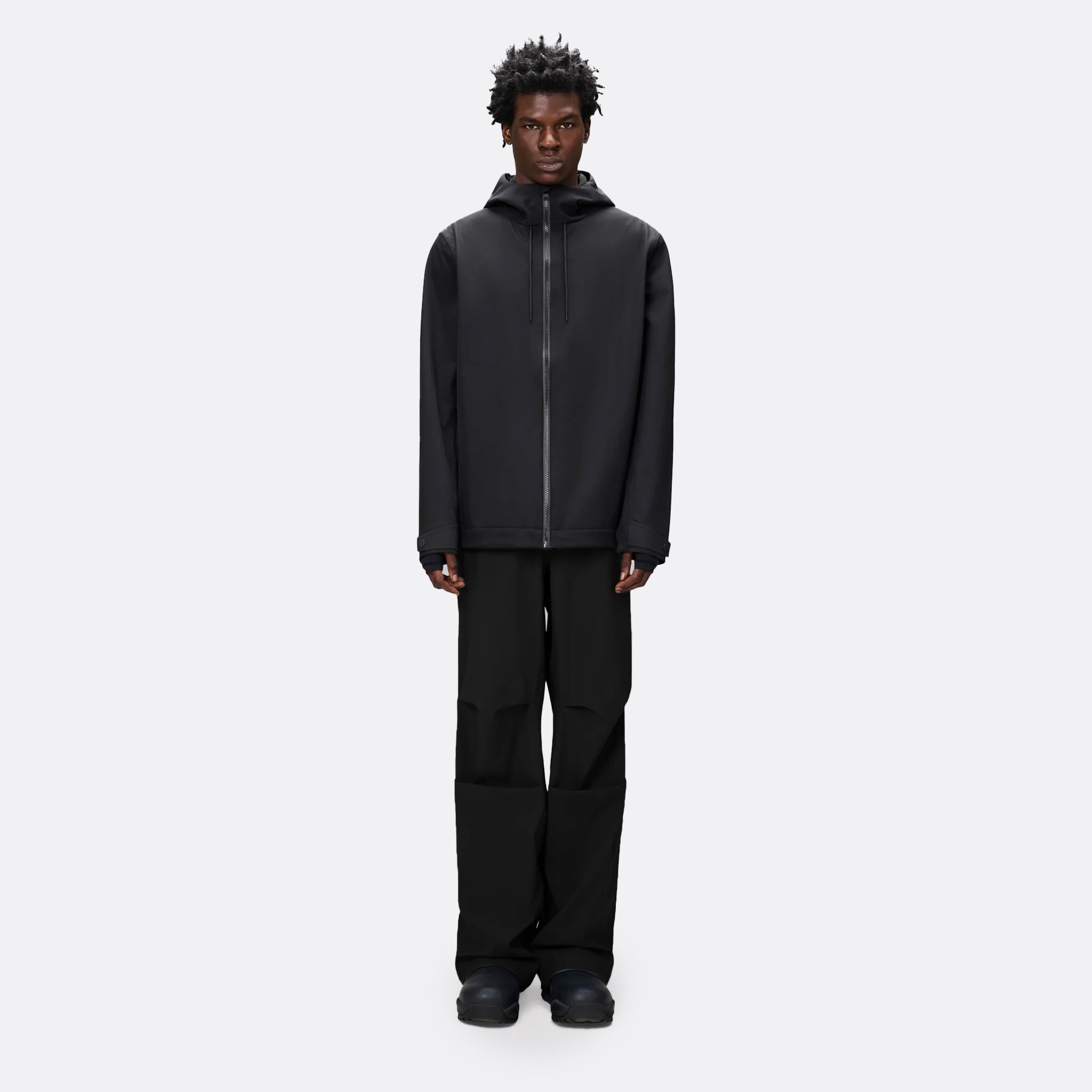 Suva Hardshell Short String Jacket by Rains in Black