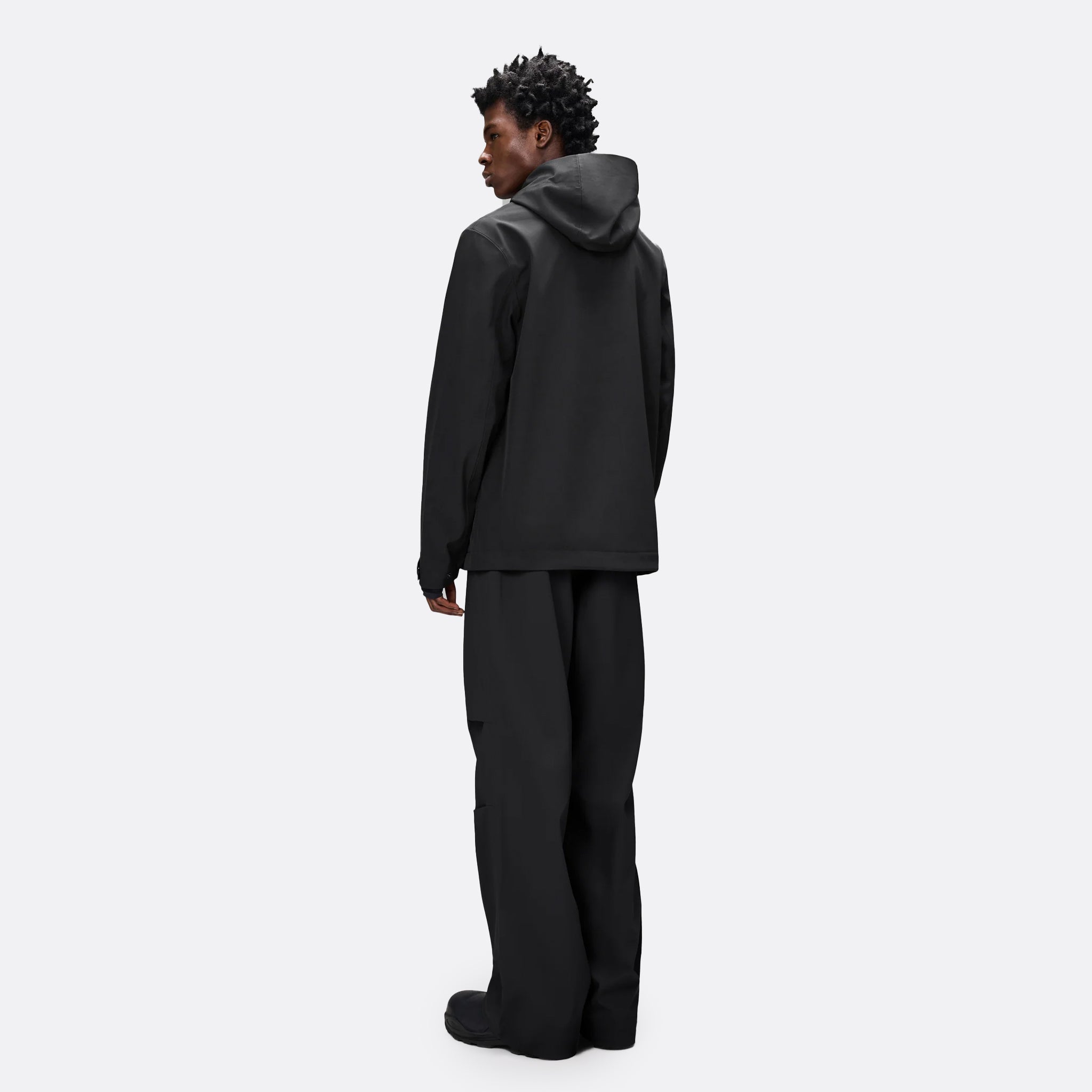 Suva Hardshell Short String Jacket by Rains in Black