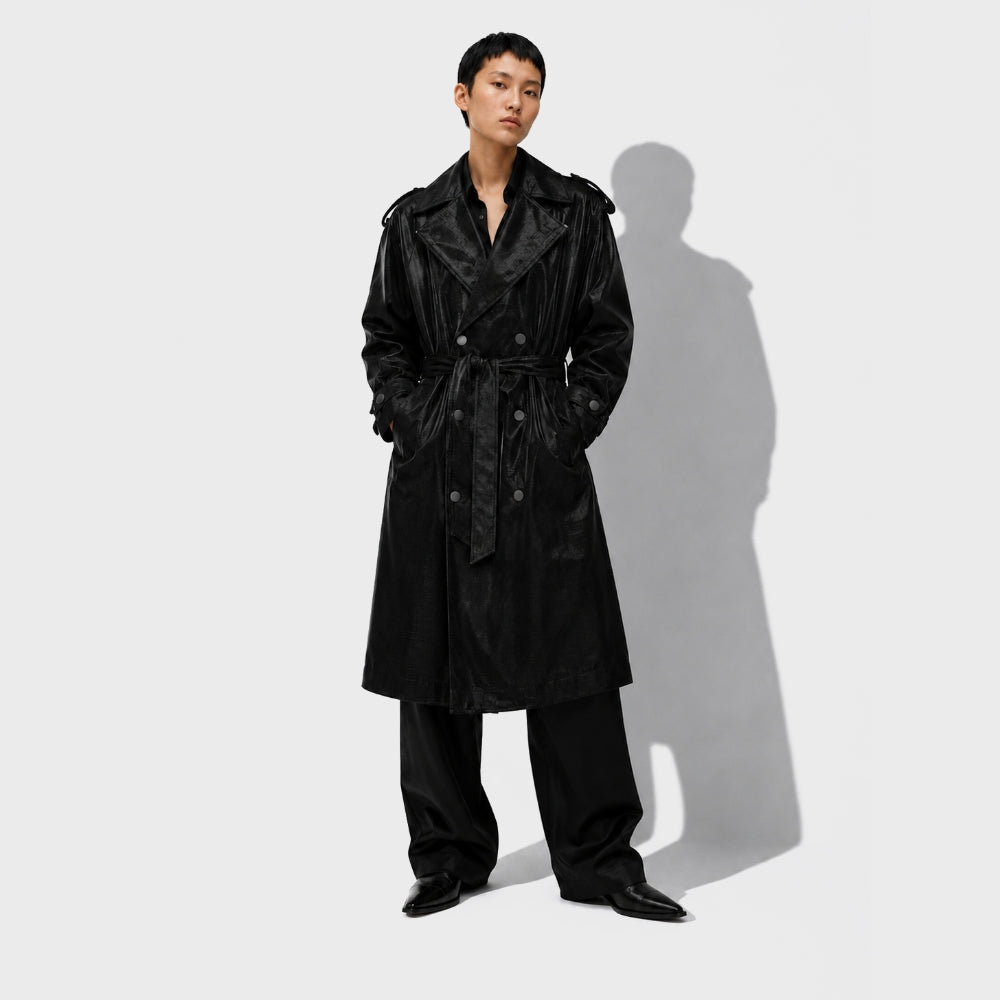 Black leather trench coat styled with wide-leg trousers – shop designer women’s ready-to-wear at ELLIS ROSCH