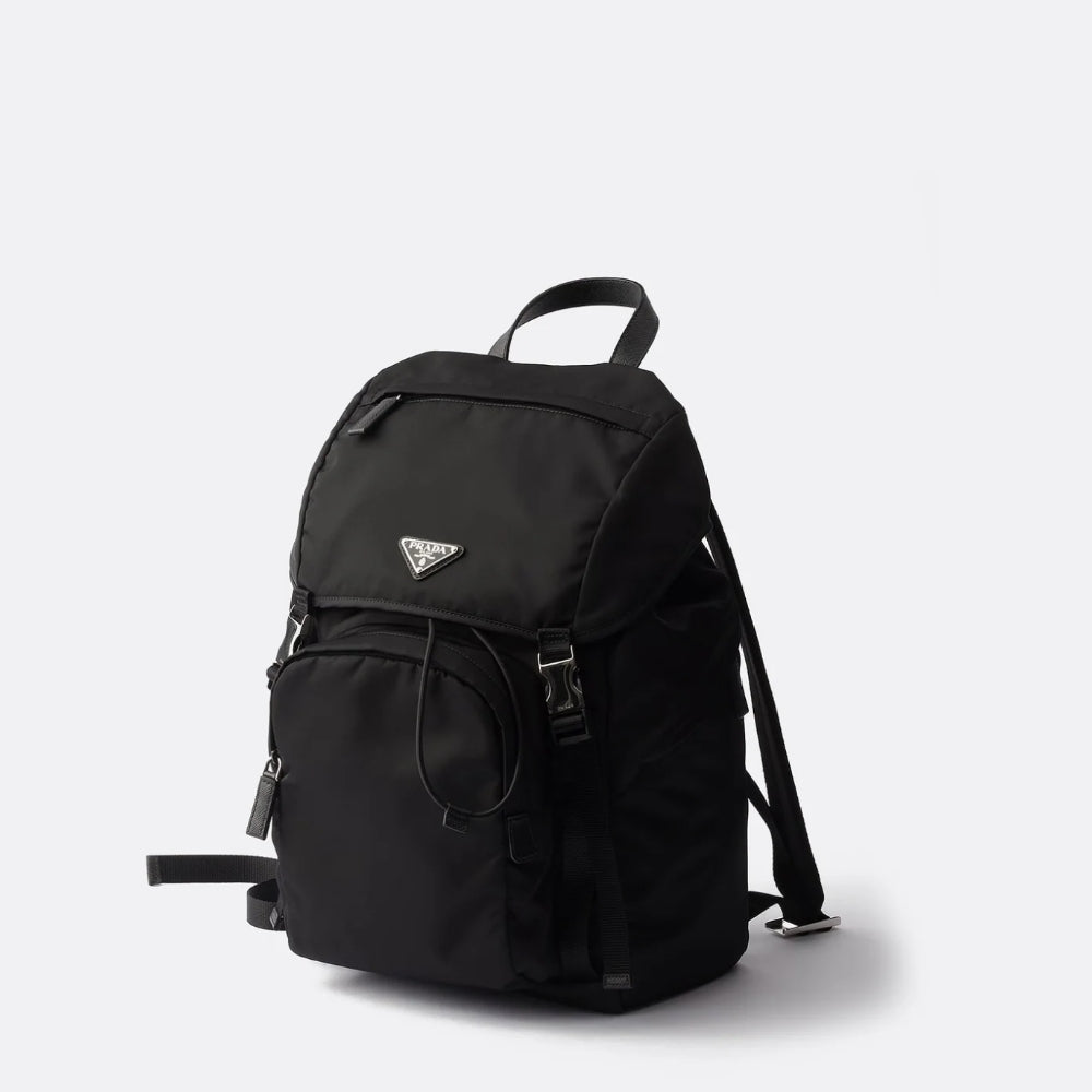 Prada black nylon backpack featuring a sleek, functional design with signature logo plaque, combining modern Italian luxury with utilitarian craftsmanship and everyday versatility.