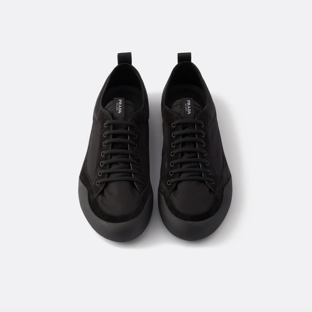 Prada black low-top sneakers with tonal laces and rubber soles – shop designer men’s footwear at ELLIS ROSCH