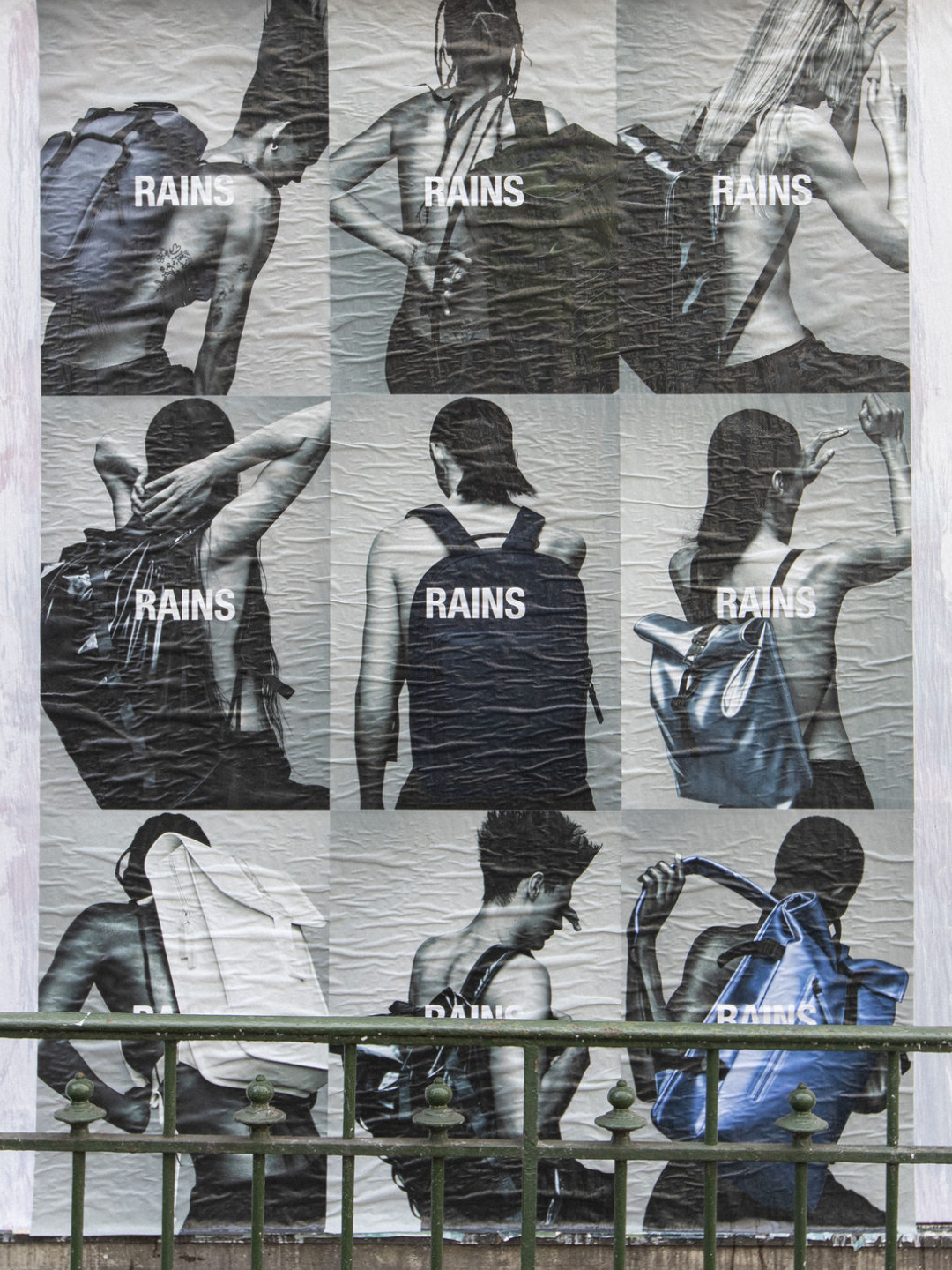 Editorial street poster featuring RAINS waterproof backpacks — monochrome portraits of minimalist Scandinavian design blending function and fashion.